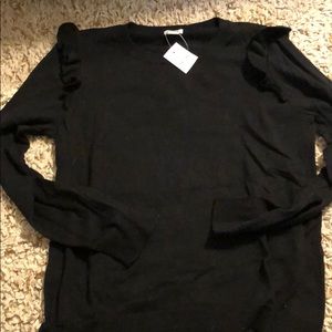 J crew black sweater with shoulder detail.